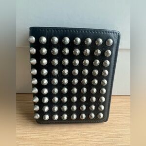 Christian Louboutin spikes wallet.